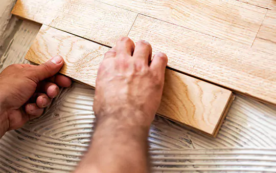 Professional installation of new flooring | Carpetland USA Granite & Flooring