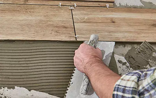 Tile installation by experienced professionals | Carpetland USA Granite & Flooring