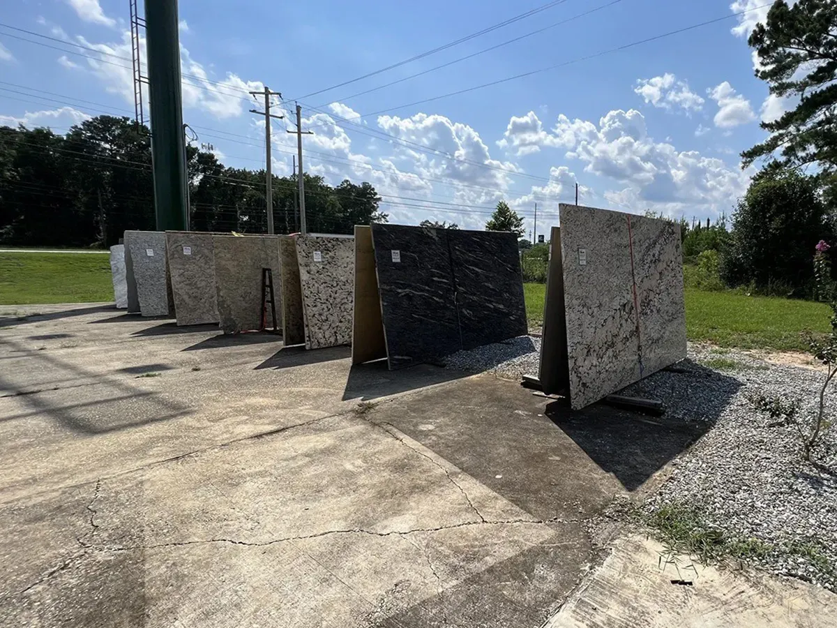Granite countertop slabs featuring different colors and natural patterns | Carpetland USA Granite & Flooring