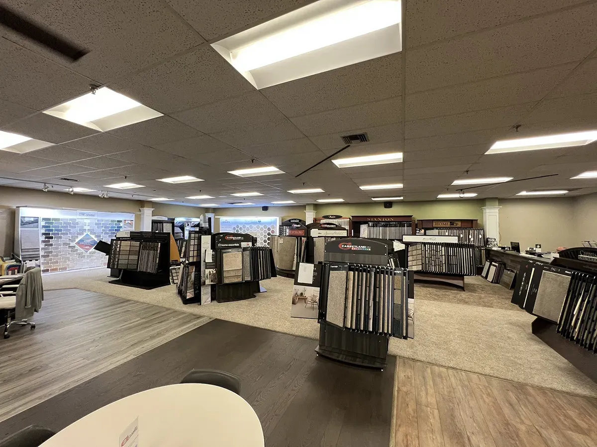 A variety of carpet and flooring samples on display in the showroom | Carpetland USA Granite & Flooring