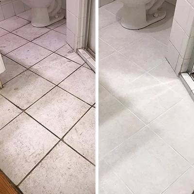 Dirty and clean bathroom floor grout shown in a before and after comparison | Carpetland USA Granite & Flooring