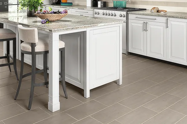 Kitchen with tile flooring in a high-traffic area | Carpetland USA Granite & Flooring