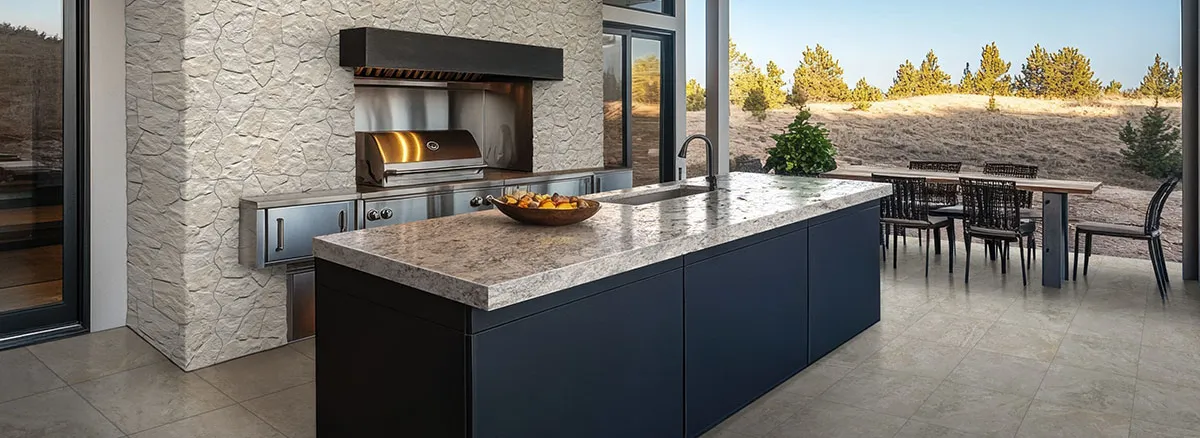 Granite outdoor countertop in kitchen with grill and sink | Carpetland USA Granite & Flooring