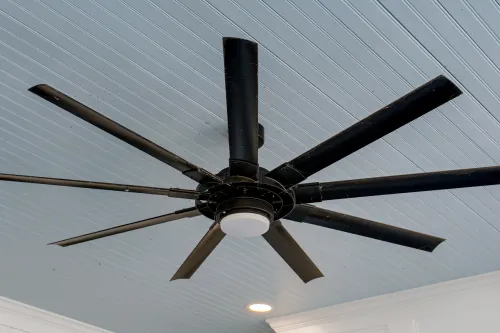 Outdoor fan hanging from porch area | Carpetland USA Granite & Flooring